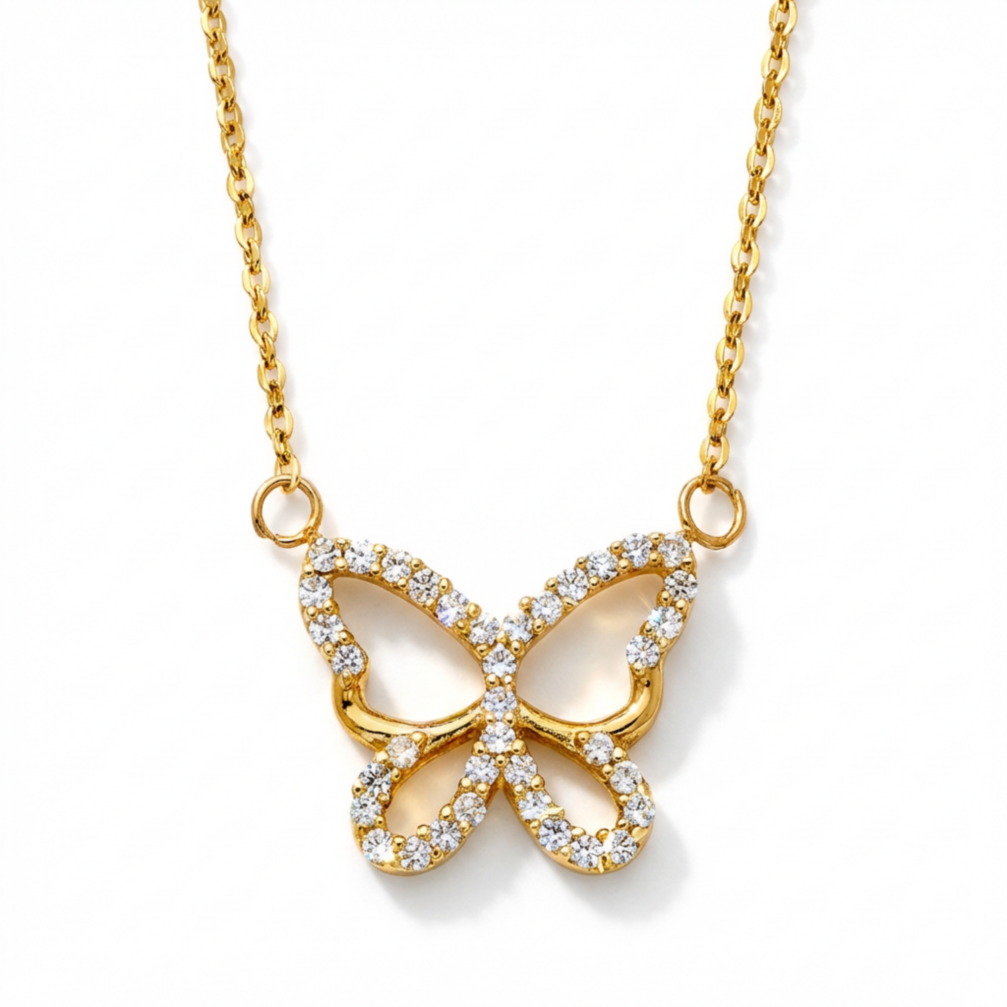gold butterfly necklace close up pavé detail
