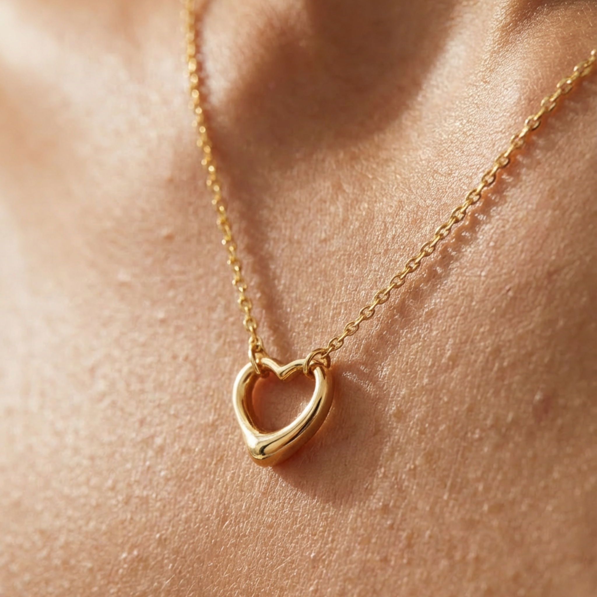 Minimalist gold heart necklace front view