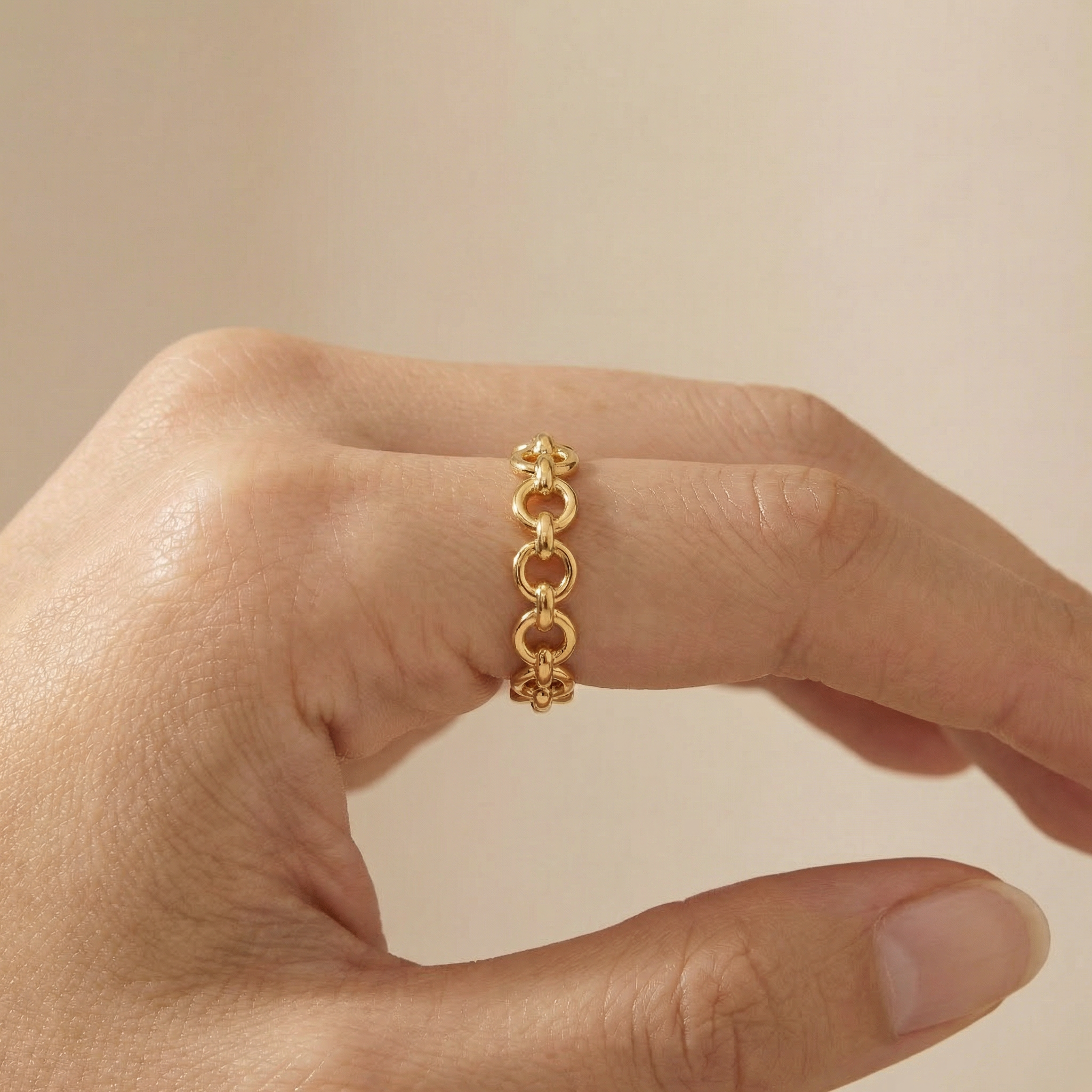 dainty gold chain style ring polished finish detail
