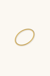 Gold ring on a white background