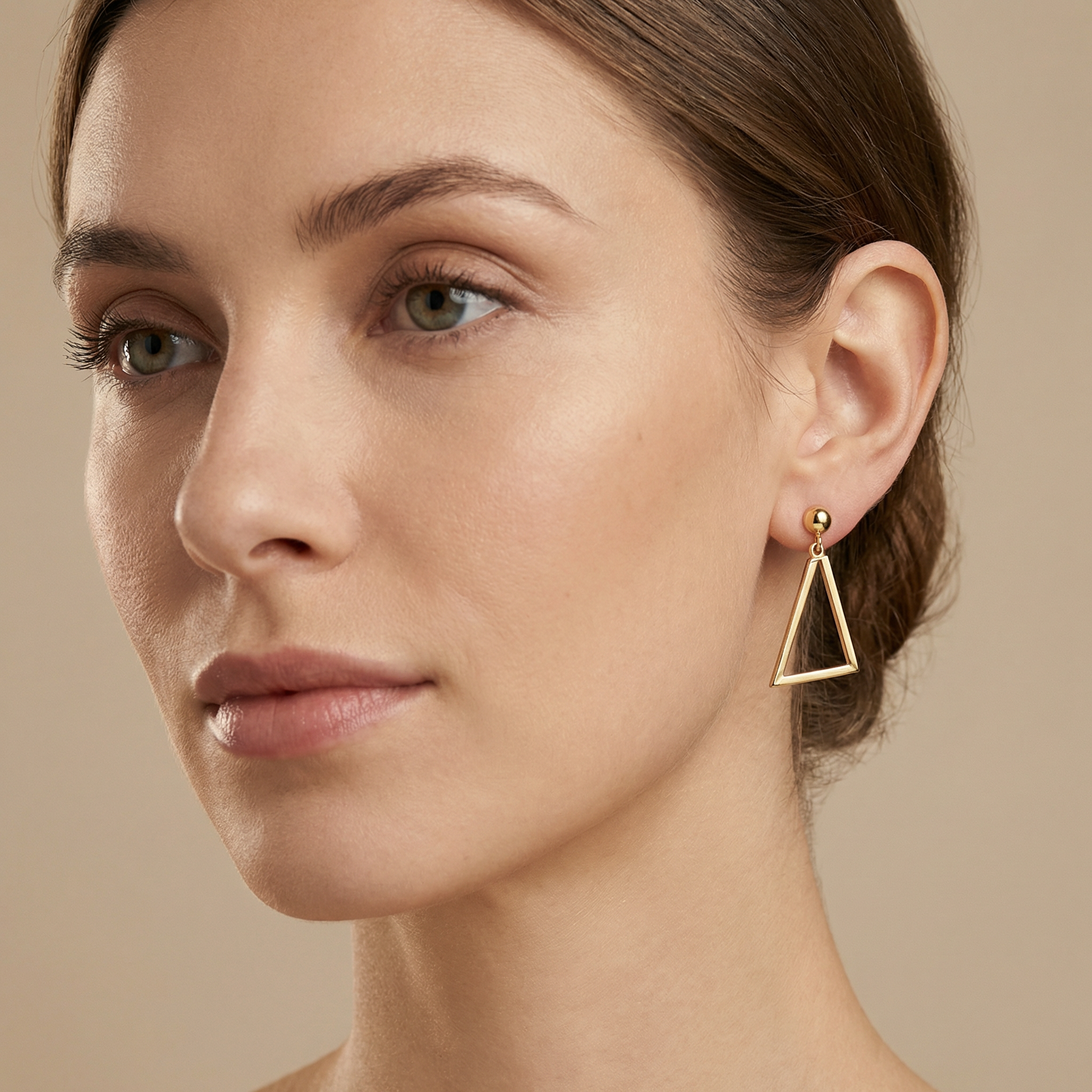 Modern geometric triangle dangle earrings in yellow gold