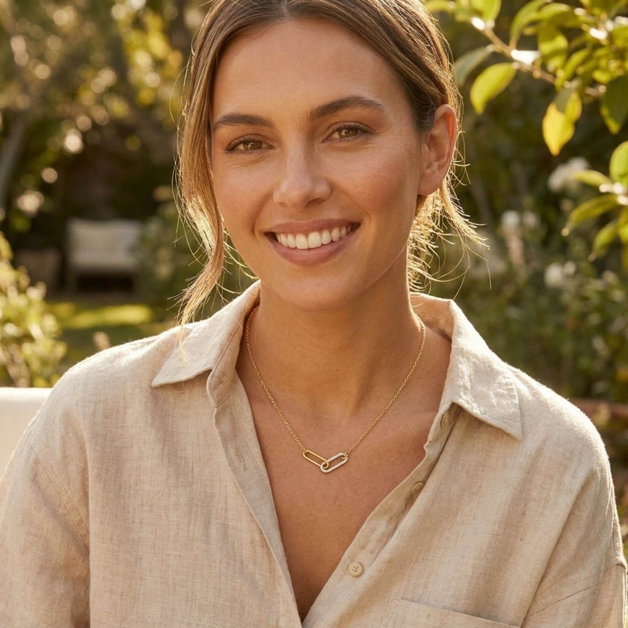 Modern yellow gold necklace featuring textured and polished elongated links