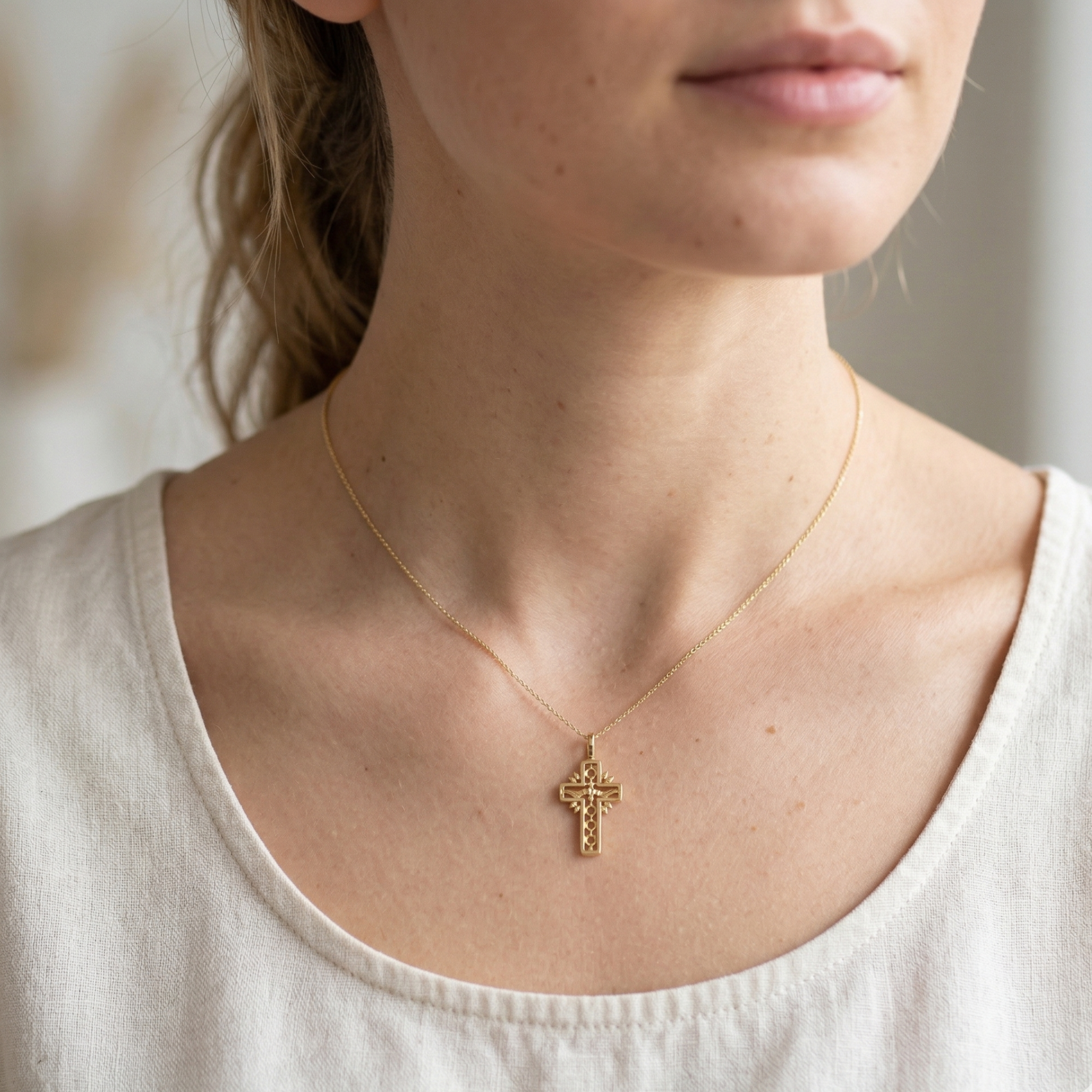 High-polish 14k gold religious pendant with diamond-cut texture