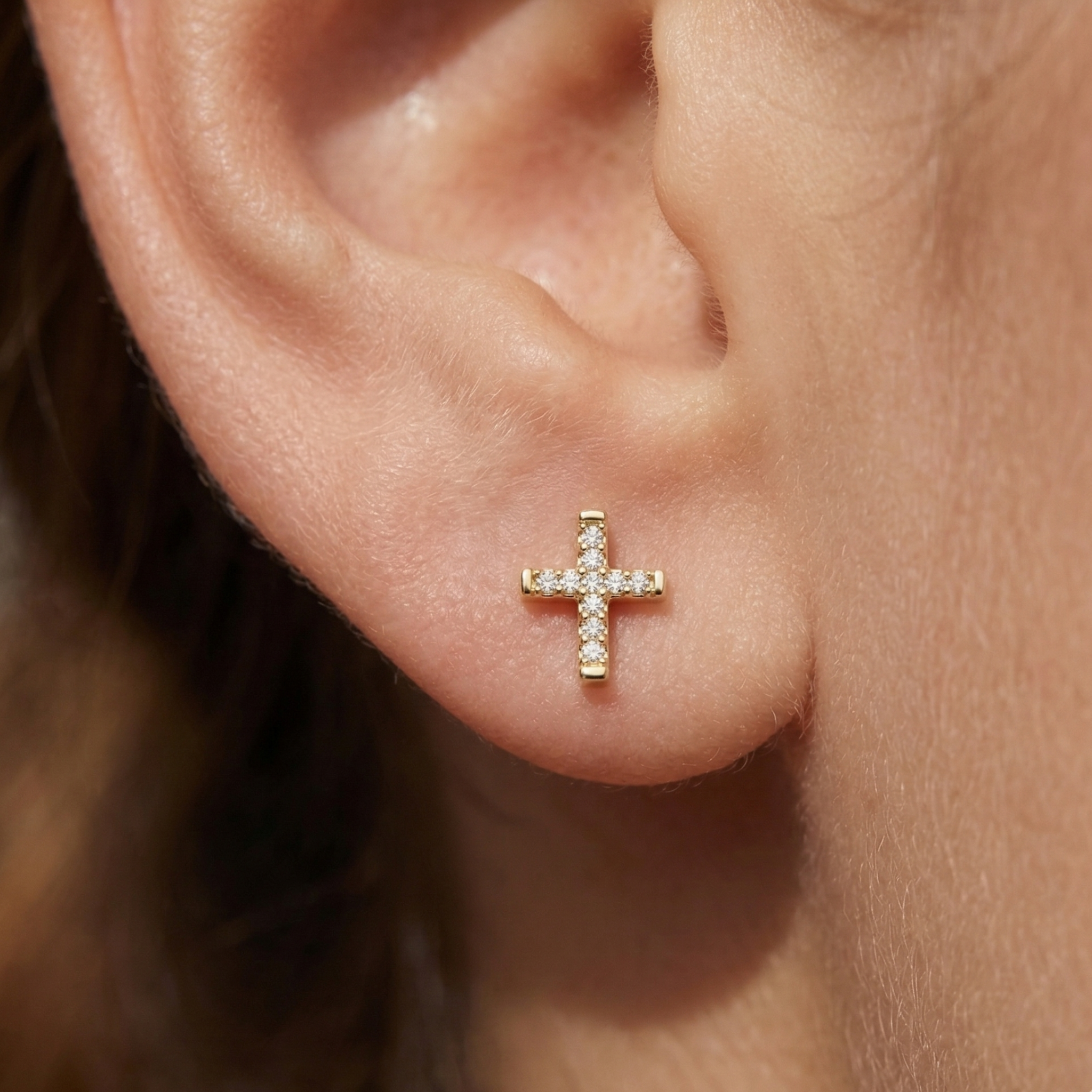 Dainty yellow gold cross studs 8mm height for multiple piercings