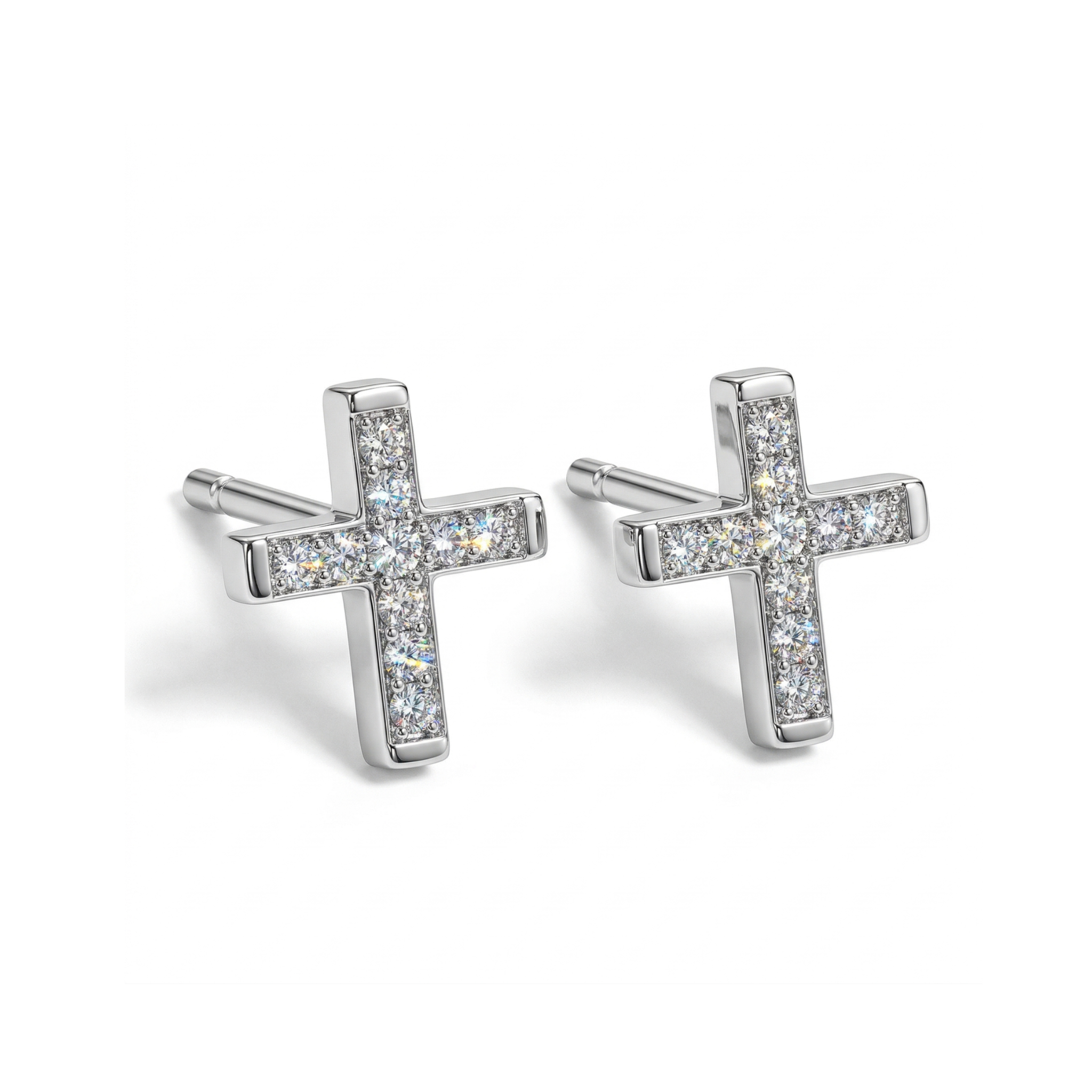 Small 14k white gold cross studs for curated ear on white background