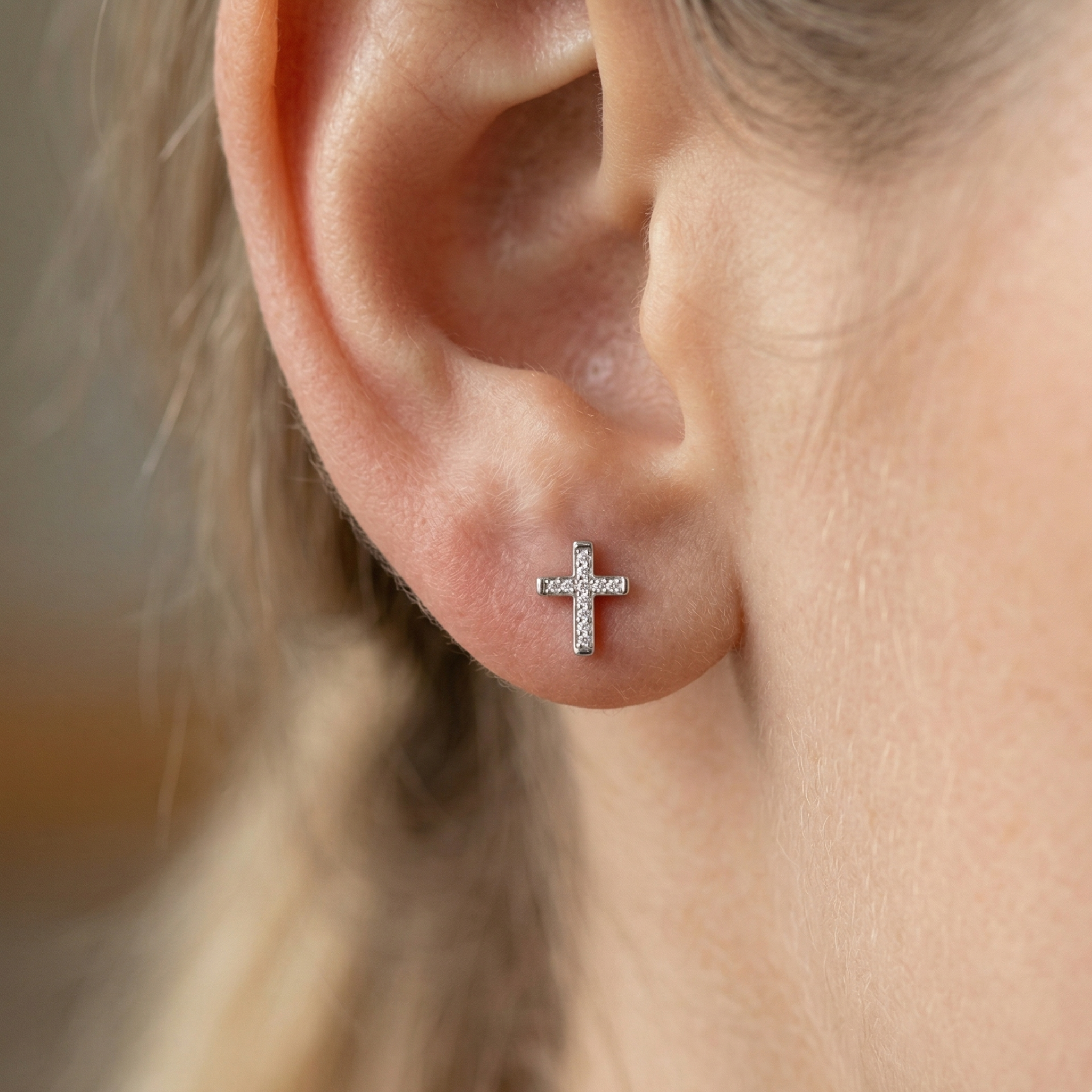 High-polish 14k white gold religious earrings with shimmering detail front view