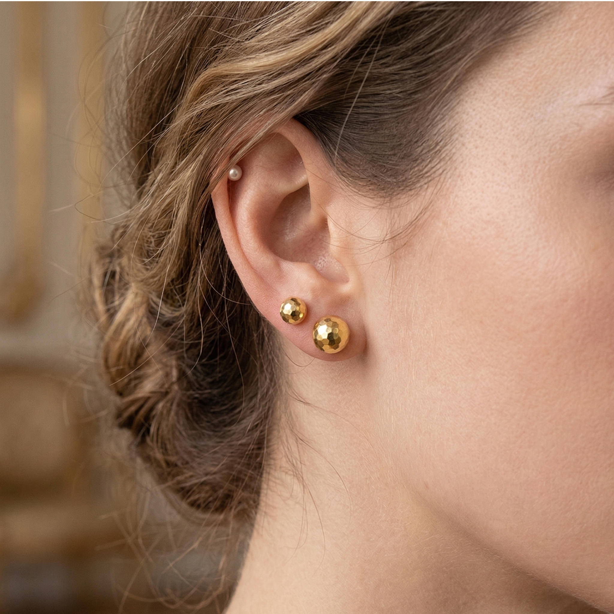 High-shine faceted 14k gold ball earrings with butterfly push-backs