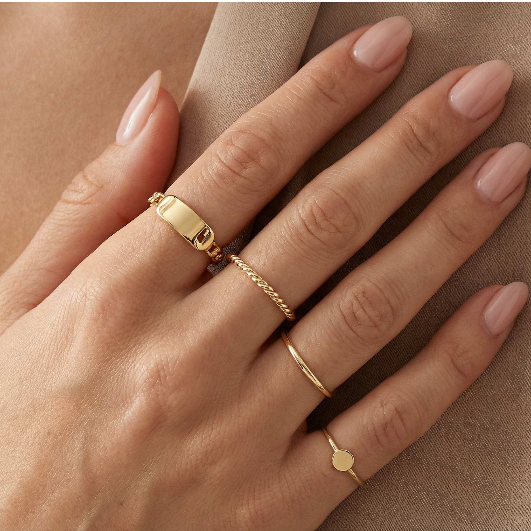14k gold stackable signet ring on finger layered gold rings minimalist jewelry