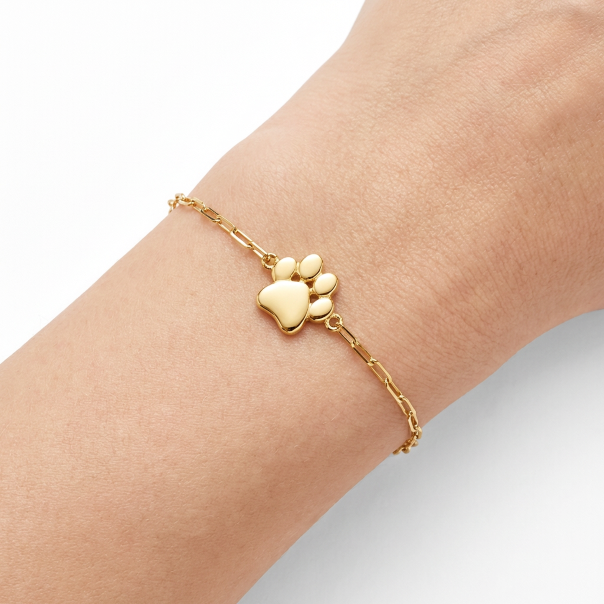 lightweight gold bracelet worn on female wrist top view