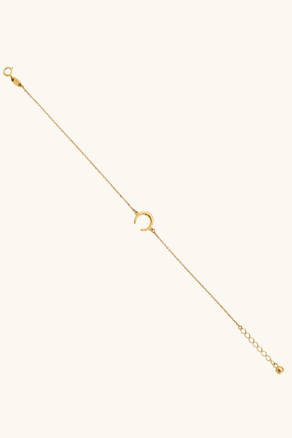 14k solid gold crescent moon bracelet on female wrist, dainty adjustable chain jewelry