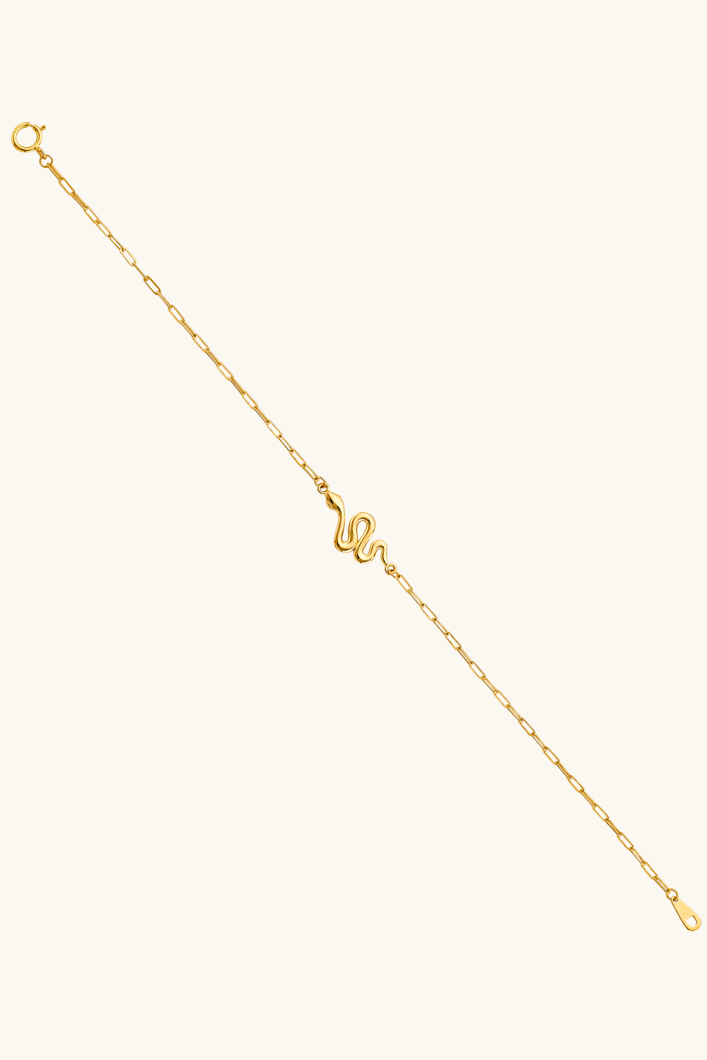 14K solid gold snake charm bracelet on female wrist paperclip chain