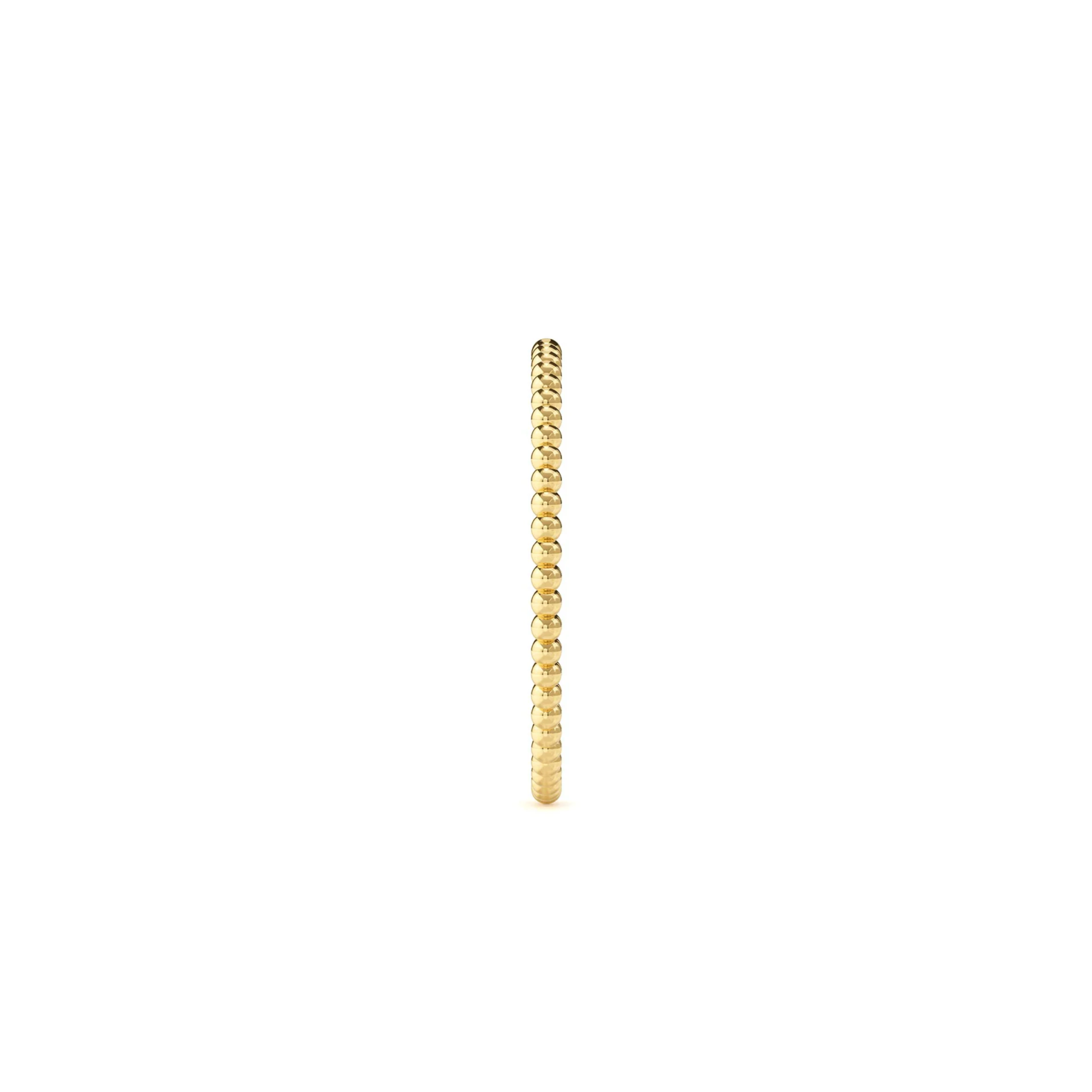 Gold ring on a white background