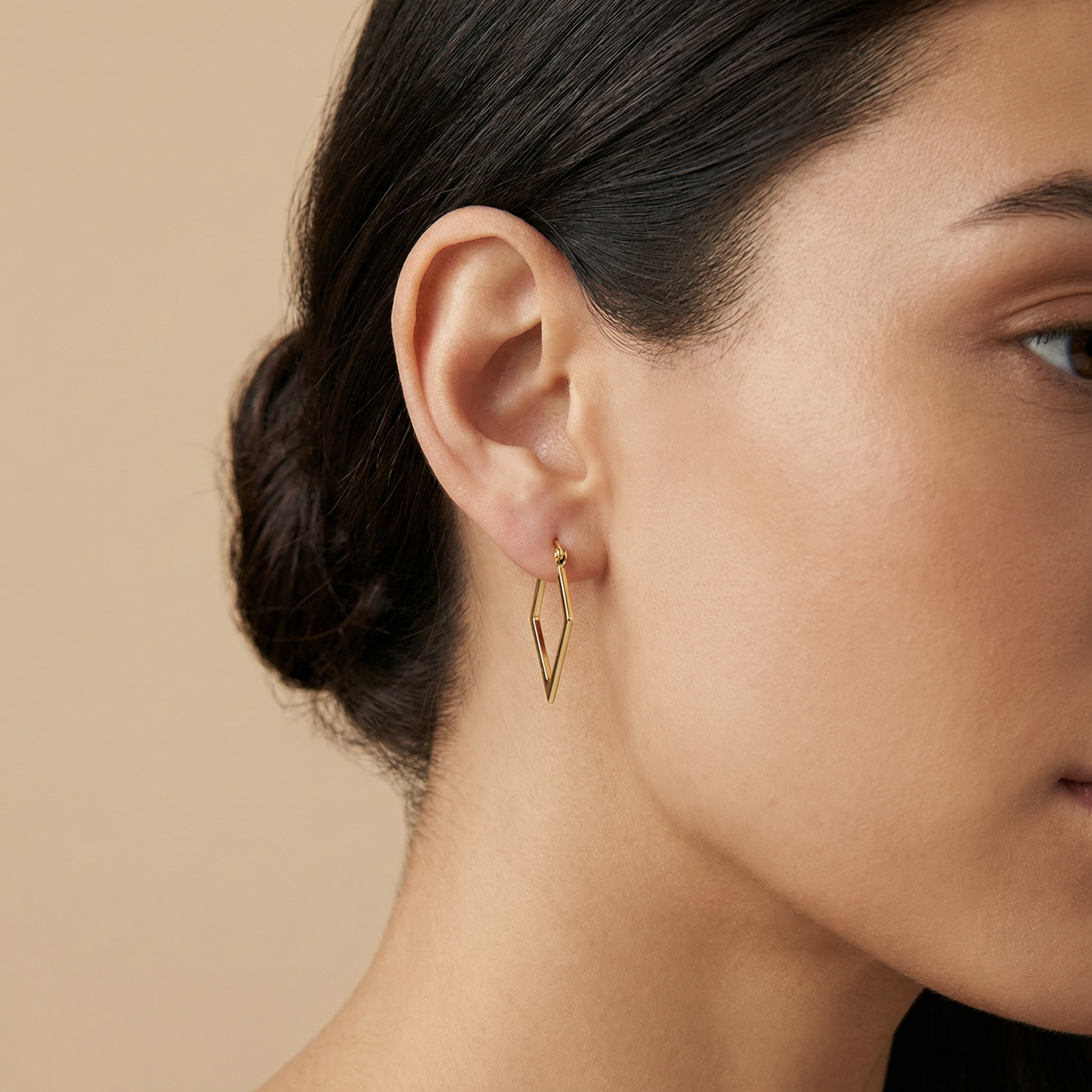 14k yellow gold geometric v-shaped hoops with latch back closure