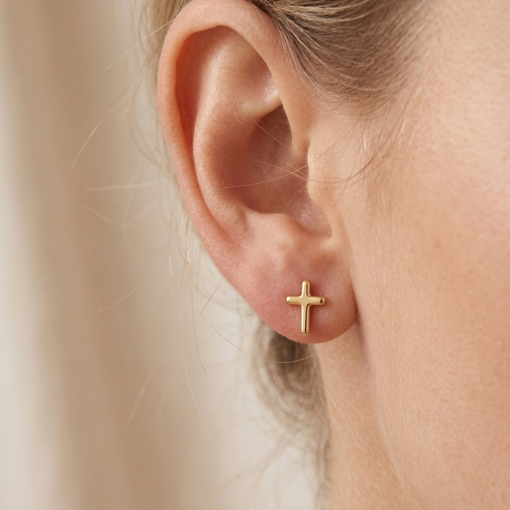Sleek 14k gold religious earrings for daily wear on white background