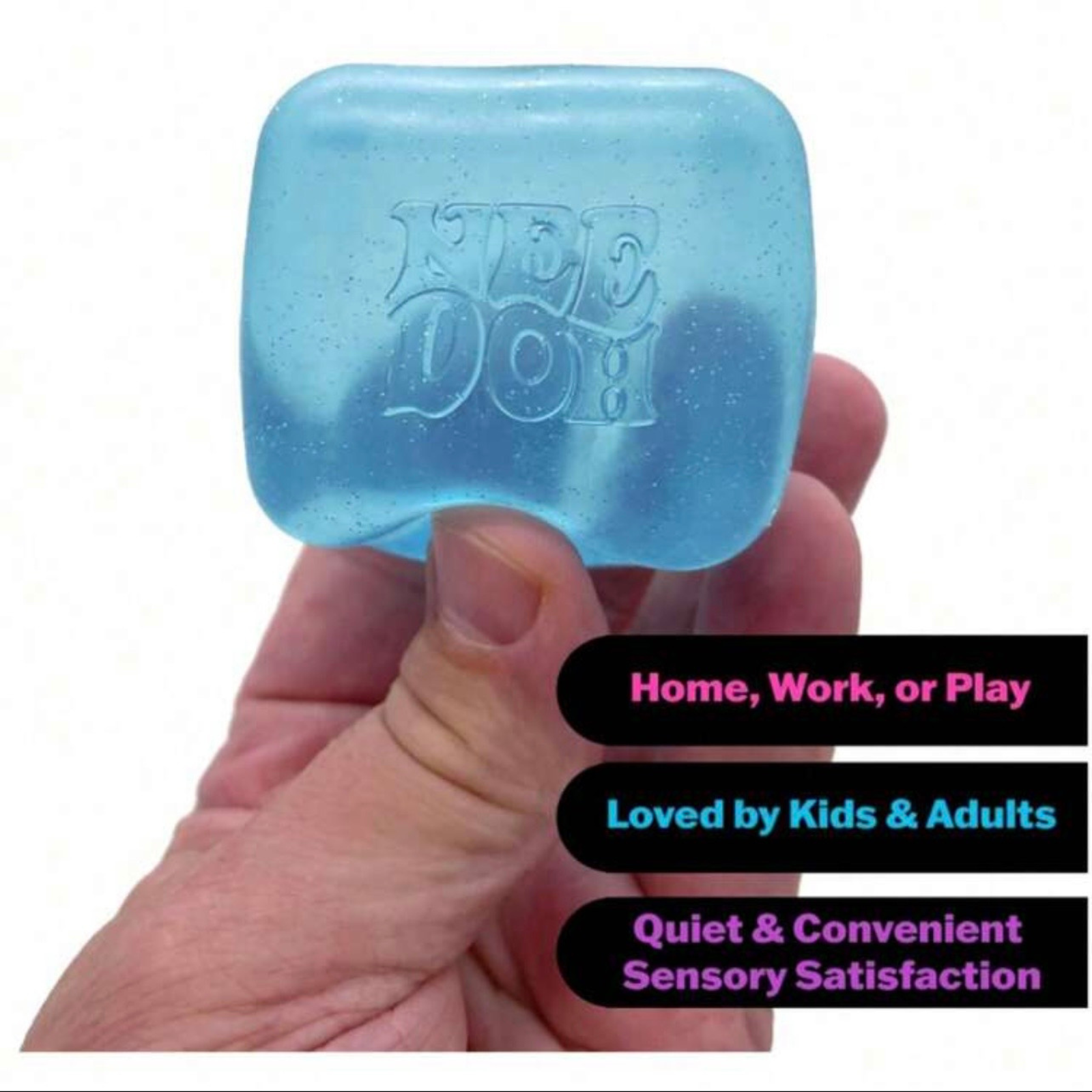 Close-up of a hand holding a blue NeeDoh Nice Cube, highlighting its use as a quiet, convenient sensory fidget toy for home, work, or play.