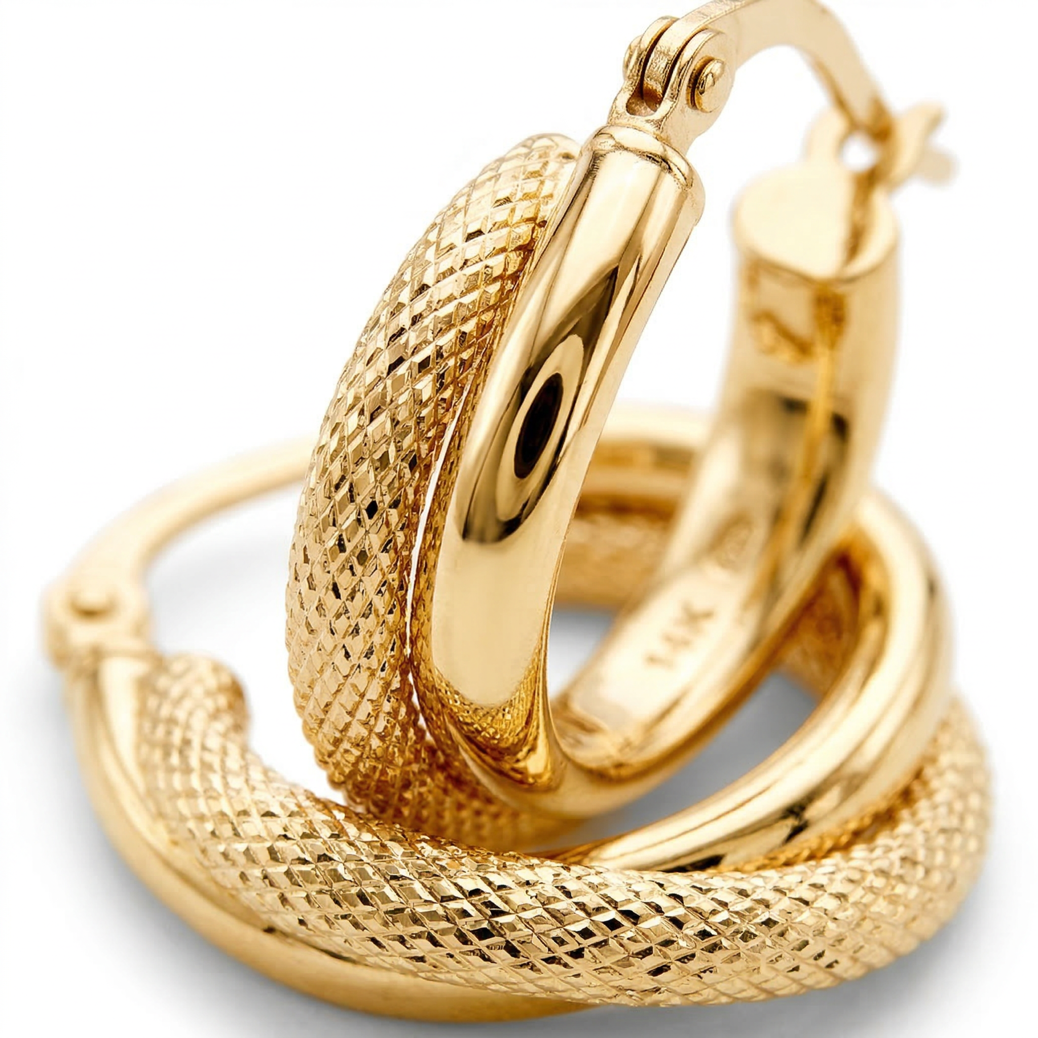 14K Solid Yellow Gold Diamond Cut Textured Double Hoop Earrings close up shot